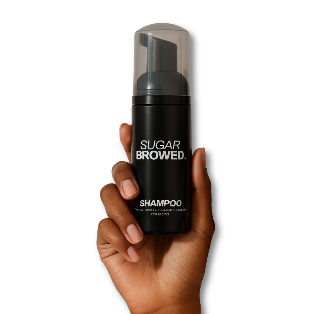 Sugar Browed Brow Shampoo held in diverse hands — gentle foaming cleanser and vitamin booster designed specifically for eyebrow care, brow extensions, and lamination treatments.