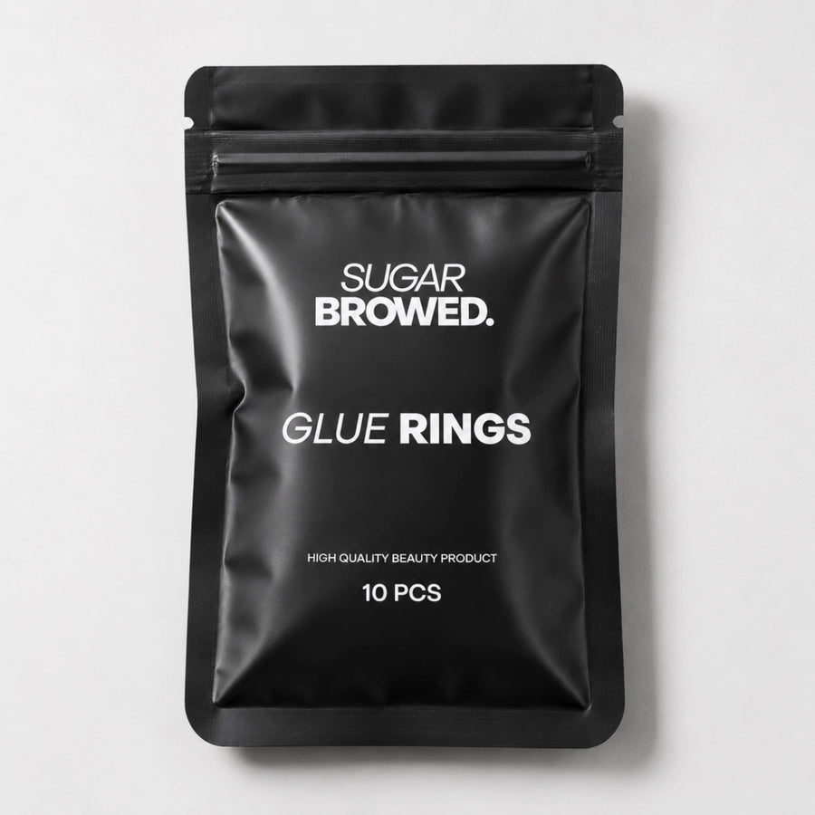 Adjustable glue rings for lash and brow artists, providing easy access to adhesive during treatments.