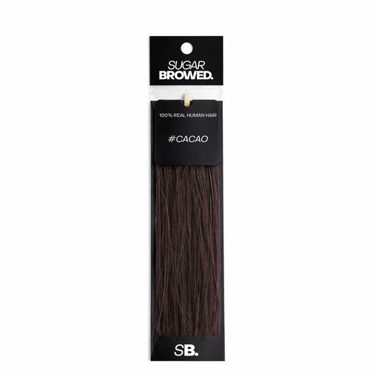 Cacao shade real human eyebrow hair extension by Sugar Browed – rich dark brown tone for bold, natural-looking brows using 100% human hair.
