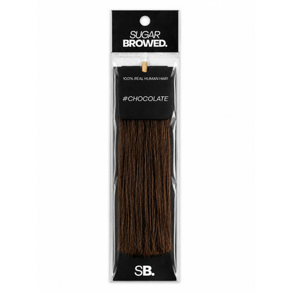 Chocolate shade real human eyebrow hair extension by Sugar Browed – warm, rich brown color made from 100% natural human hair for full and natural-looking brows.