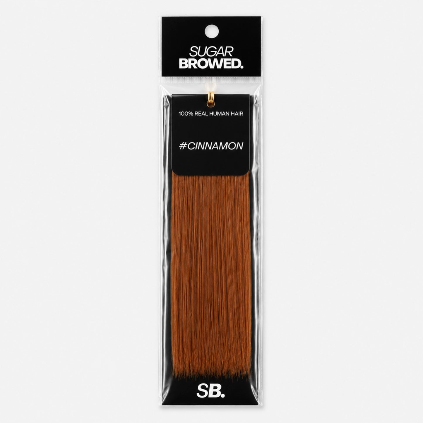Cinnamon shade real human eyebrow hair extension by Sugar Browed – warm reddish-brown brow color made from 100% natural human hair for a soft, natural look.