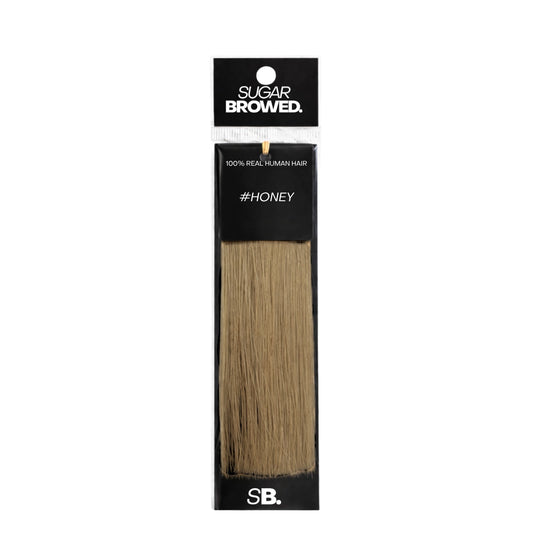 Honey shade real human eyebrow hair extension by Sugar Browed – warm beige tone for natural brow enhancement.