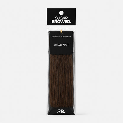 Walnut shade real human eyebrow hair extension by Sugar Browed – deep, cool dark brown 100% human hair for full, defined and natural-looking brows.