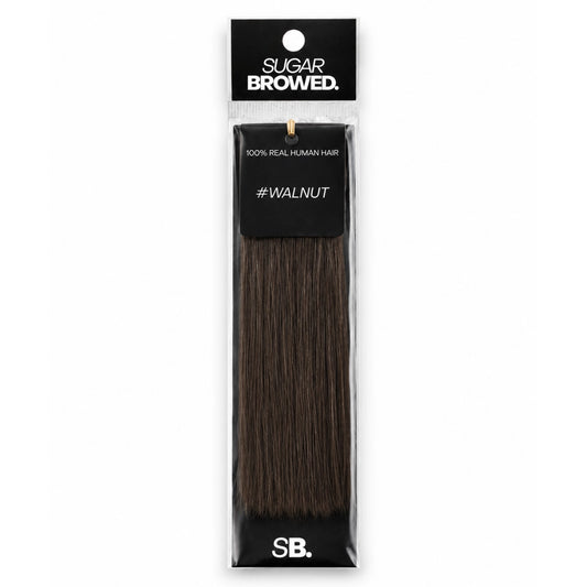 Walnut shade real human eyebrow hair extension by Sugar Browed – deep, cool dark brown 100% human hair for full, defined and natural-looking brows.