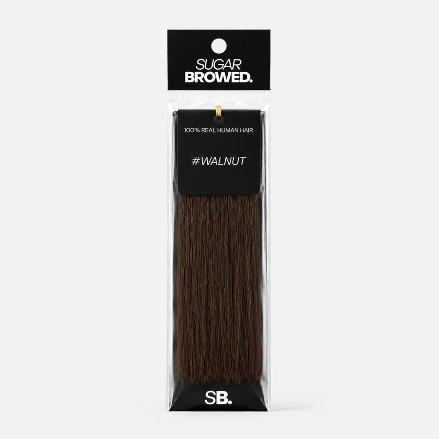 Walnut shade real human eyebrow hair extension by Sugar Browed – deep, cool dark brown 100% human hair for full, defined and natural-looking brows.