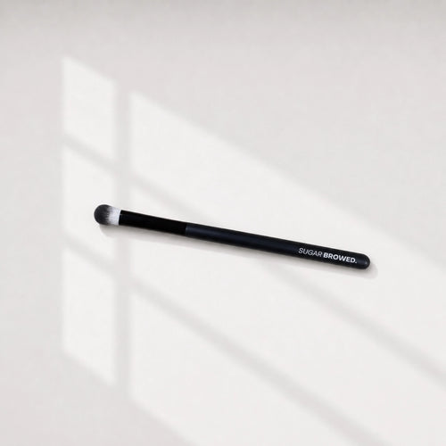 Professional black eyebrow blending brush with soft bristles – ideal for precise brow tint application by SUGAR BROWED.