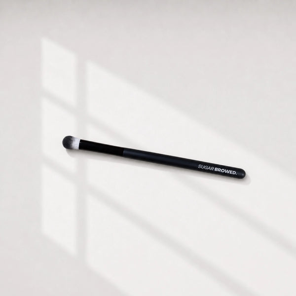 Professional black eyebrow blending brush with soft bristles – ideal for precise brow tint application by SUGAR BROWED.