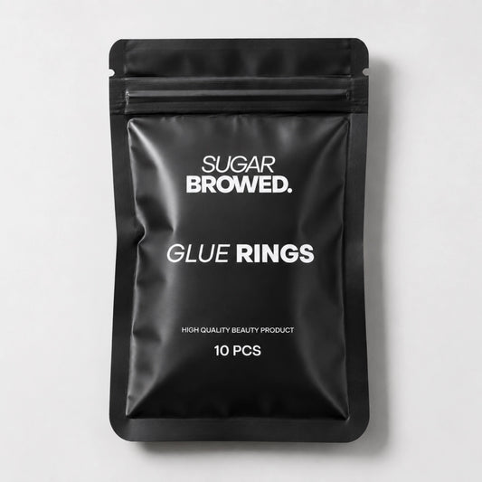Adjustable glue rings for lash and brow artists, providing easy access to adhesive during treatments.