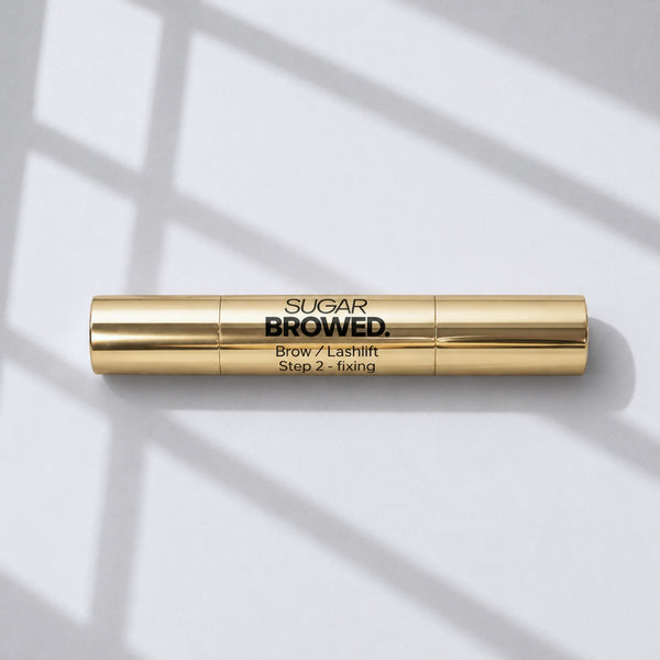 Sugar Browed Brow & Lashlift Step 2 Fixing lotion in luxury gold packaging for professional brow lamination and lash lift treatments.