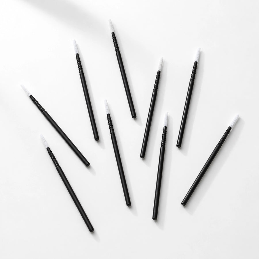 Sugar Browed disposable micro brushes for precise application and product removal during real human lash and eyebrow extension and lamination treatments.