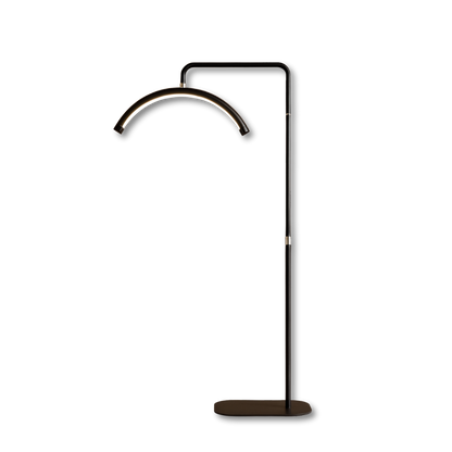 Modern black arched LED UV lamp with stand for brow extension treatments