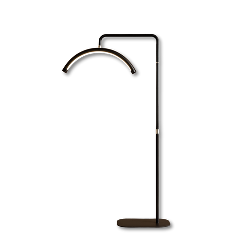 Modern black arched LED UV lamp with stand for brow extension treatments