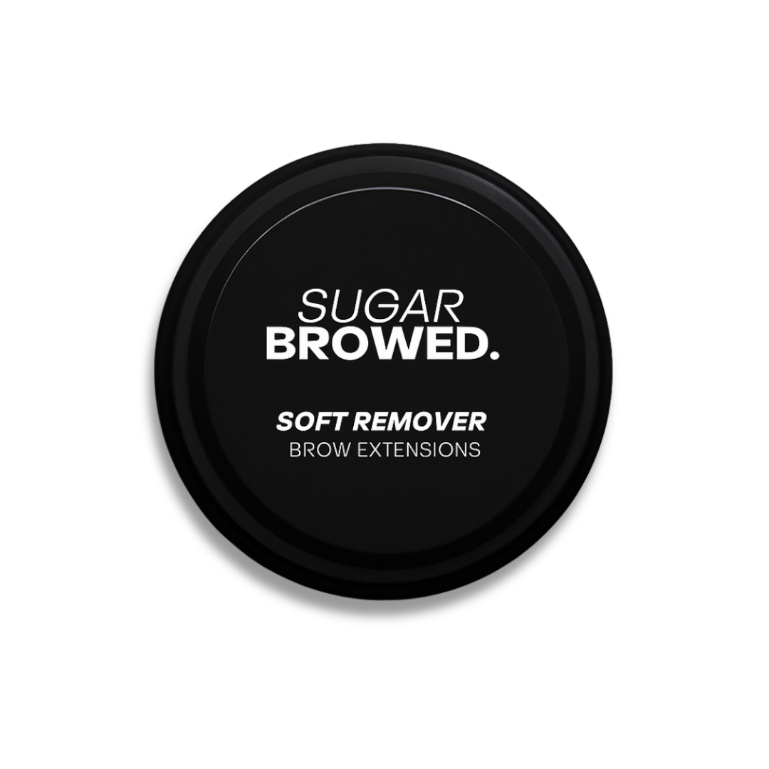 Round black jar labeled Sugar Browed Soft Remover for Brow Extensions