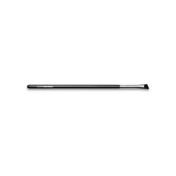 Angled tint brush with fine bristles for precise and even application during lash and brow tinting treatments.