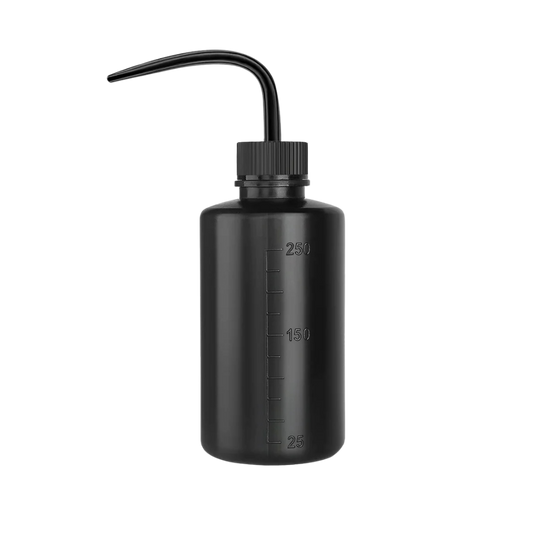 Professional water bottle with a fine nozzle for controlled rinsing during lash and brow treatments.